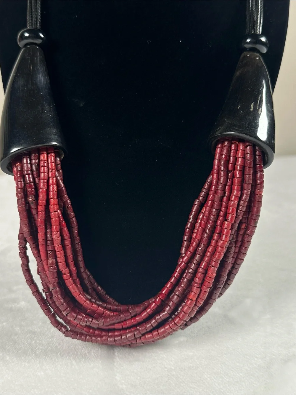 Multi-Strand Burgundy Bead Necklace with Black Accents